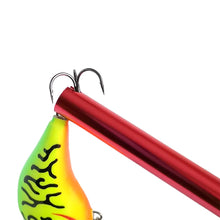 Load image into Gallery viewer, Fish hook remover holding lure&#39;s treble hook
