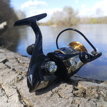 Load image into Gallery viewer, Fisherazade Hector spinning reel outdoors